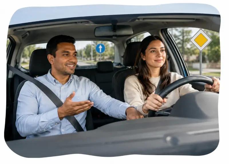 Certified driving instructor teaching a student during an in-car lesson